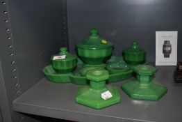 An art deco dressing table set of emerald green milk glass.