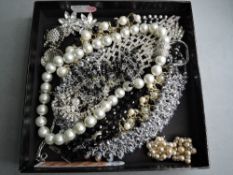 A small selection of costume jewellery including diamante necklaces and earrings etc