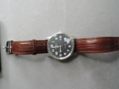 A gent's Astbury automatic wrist watch having Arabic numeral dial with date aperture to black face