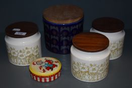 A group of three Hornsea 'fleur' pattern storage jars and a larger 1970's storage jar.