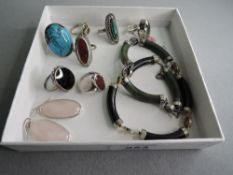 A selection of white metal dress rings, many stamped 925/silver of various forms, a pair of pink