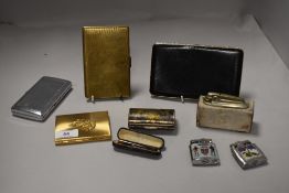 A selection of cigarette lighters smokers cases and similar