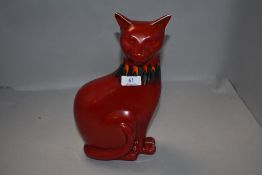 A mid century styled Poole pottery cat figure in a Delphis glaze