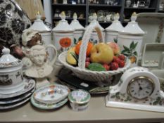 A mixed lot of ceramics including French kitchen storage jars,novelty tea pot, Wedgwood mantel clock