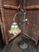 A modern library Tiffany style table lamp