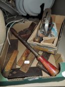 A selection of wood workers tools including block plane and set squares