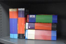 Five JK Rowling Harry potter books.