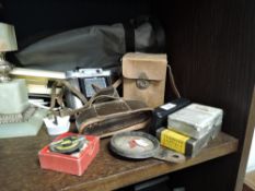 A selection of photographic equipment and two cameras