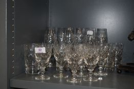 A selection of clear cut crystal glass wares by Webb Corbet including wine and water glasses