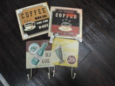 A selection of reproduction style tin signs