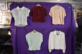 A collection of 1940s and 50s ladies blouses, some good sizes amongst this lot.