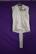 An iconic vintage satin gym slip, circa 1930s to 1950s 'The womens League of health and beauty'.