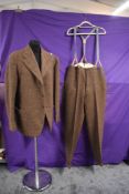 A gents 1940s single breasted tweed suit,with button fly trousers.