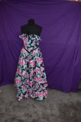 A 1980s vibrant Laura Ashley strapless gown.