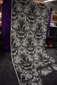 A good quantity of high quality bold black and white cotton fabric by De Bernard Nevil 'Phaselis'.