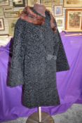 A 1960s Astrakhan coat having mink collar.
