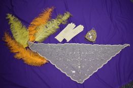 A mixed lot including beaded Victorian coin purse,tulle shawl, gloves and four long dyed feathers.