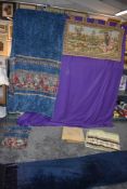 A selection of vintage chenille throws,curtains and coverings, some floral, others midnight blue,