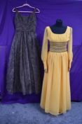 An early 1960s brown evening gown by Jean Allen having gathered waist and full skirt and a similar