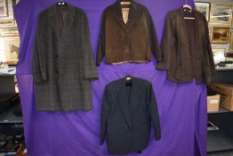 A vintage 1950s grey and black pinstripe Burton suit having button fly to trousers and single