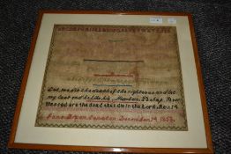 A Victorian sampler having religious quotations and alphabet, by Jane Dixon of Coniston, December