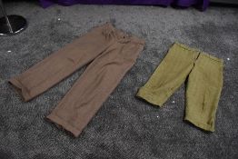 A pair of gents wool trousers with turn ups and button fly, and a pair of green tweed knee