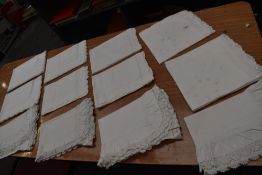 A lovely collection of antique pillow slips, some having scalloped edges, others with cutwork and