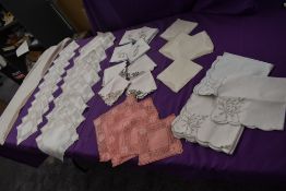 A set of linen napkins and table cloth having drawn thread work, similar sets of embroidered