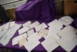 An extensive collection of table linen and damask, including place mats, tray cloths, mats and more,