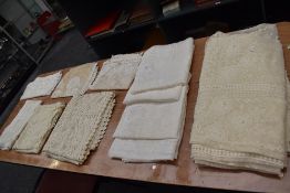 A mixed lot of vintage and antique lace and net curtains.
