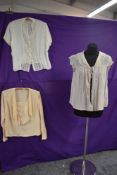 Three vintage blouses including peach 1930s example with statement collar