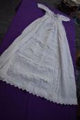 A Victorian christening gown using a variety of intricate techniques including embroidery and layers