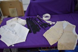 A collection of gents accessories including collars, evening scarf and waistcoat, and an antique