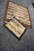 A late 19th/early 20th century hand made felt backed rabbit fur carriage rug and similar smaller