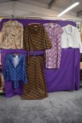 A mixed lot of ladies 1970s clothing including blouse, skirt suit and dresses.