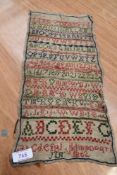 An 1862 dated sampler.