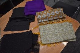 A collection of shawls including black tulle with embroidery, silk examples and two gents Tootal