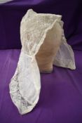 A 19th century lace widows cap or bonnet.