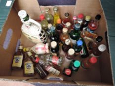 A box of mixed Alcohol Miniatures including Blair Athol 8 Year Old, Inchgower 12 Year Old,