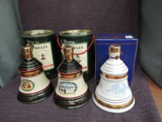 Three Wade Bell's Whisky Ceramic Bells, Christmas 1988, 1989 and 2001, two in tins and one in card