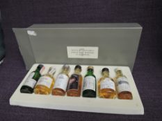 A Seven of Scotland's Finest Malt Whiskies In Miniatures set comprising, Lagavulin 16 year old,