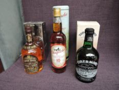 A bottle of Glenfarclas 10 year old Single Highland Malt Scotch Whisky, 40% vol, 700ml in tin