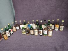 Twenty Three Whisky Miniatures mainly single malts including Sheep Dip 8 year old, Highland Mist 8
