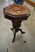 A 19th Century octagonal sewing table having inlaid and fret work decoration, AF