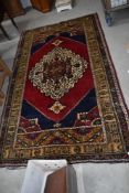 A traditional kazak style wool rug, approx 234 x 138cm, colours nice and bright