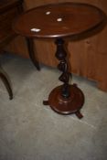 A 19th Century mahogany occasional table having open twist column and turned base, diameter