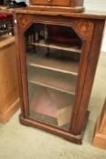 A 19th Century walnut music sheet music cabinet having glass front