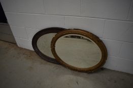 Two oval wall mirrors including gilt frame