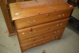 A vintage pine chest of four long drawers, having ply bases, width approx. 82cm