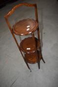 A vintage mahogany cake stand